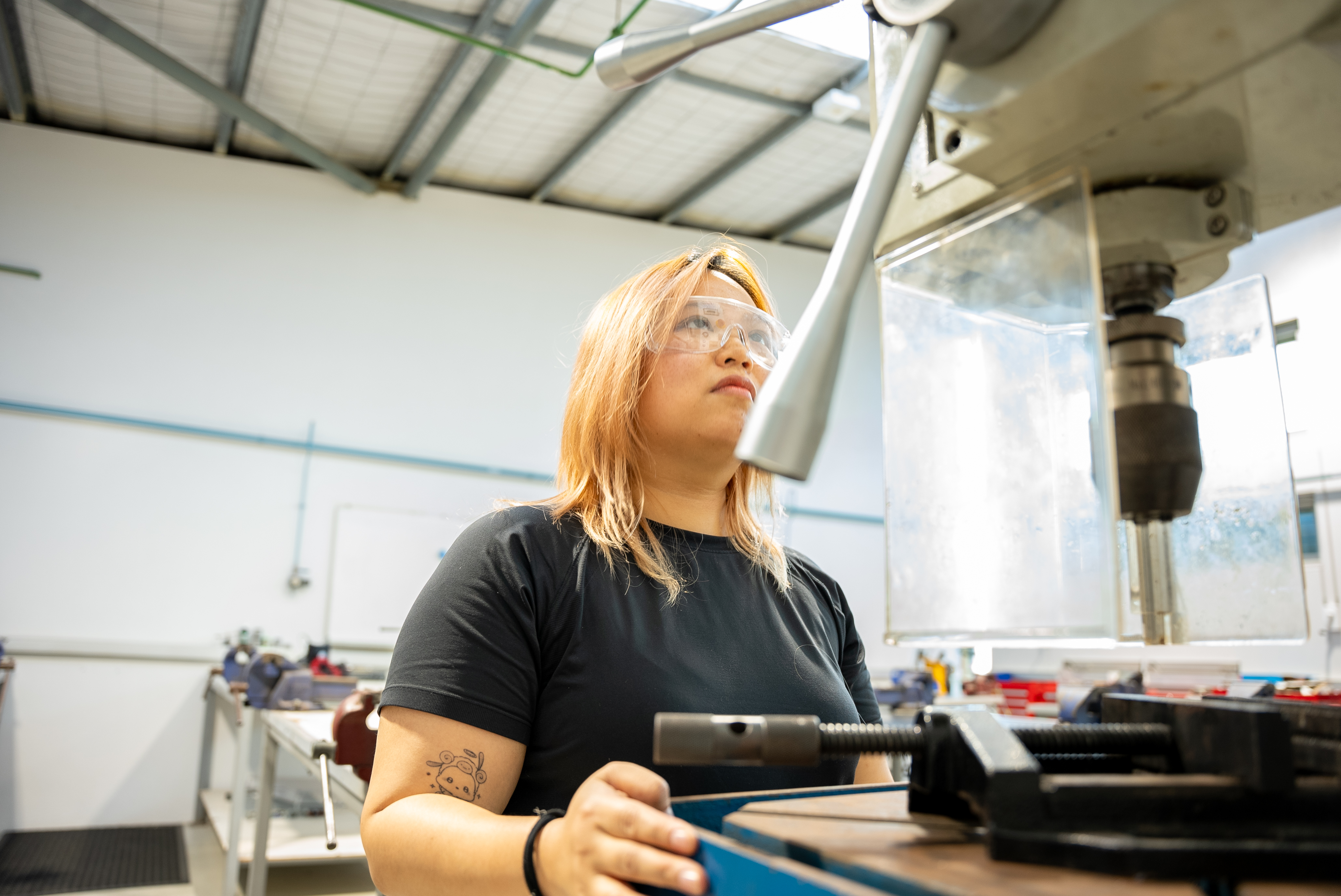 Defence engineering student using equipment.