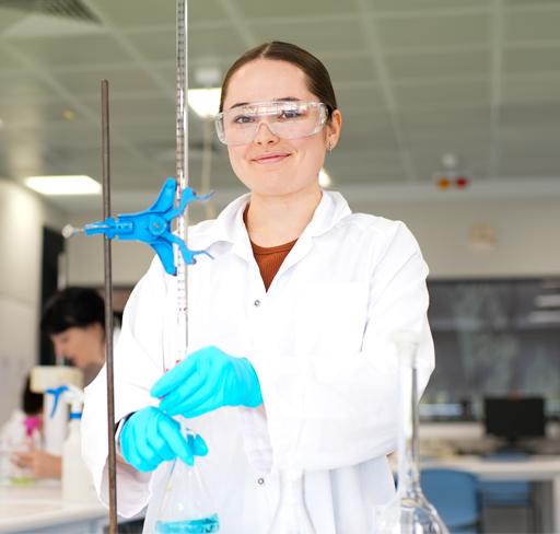 A young woman studying laboratory operations at TAFE.
